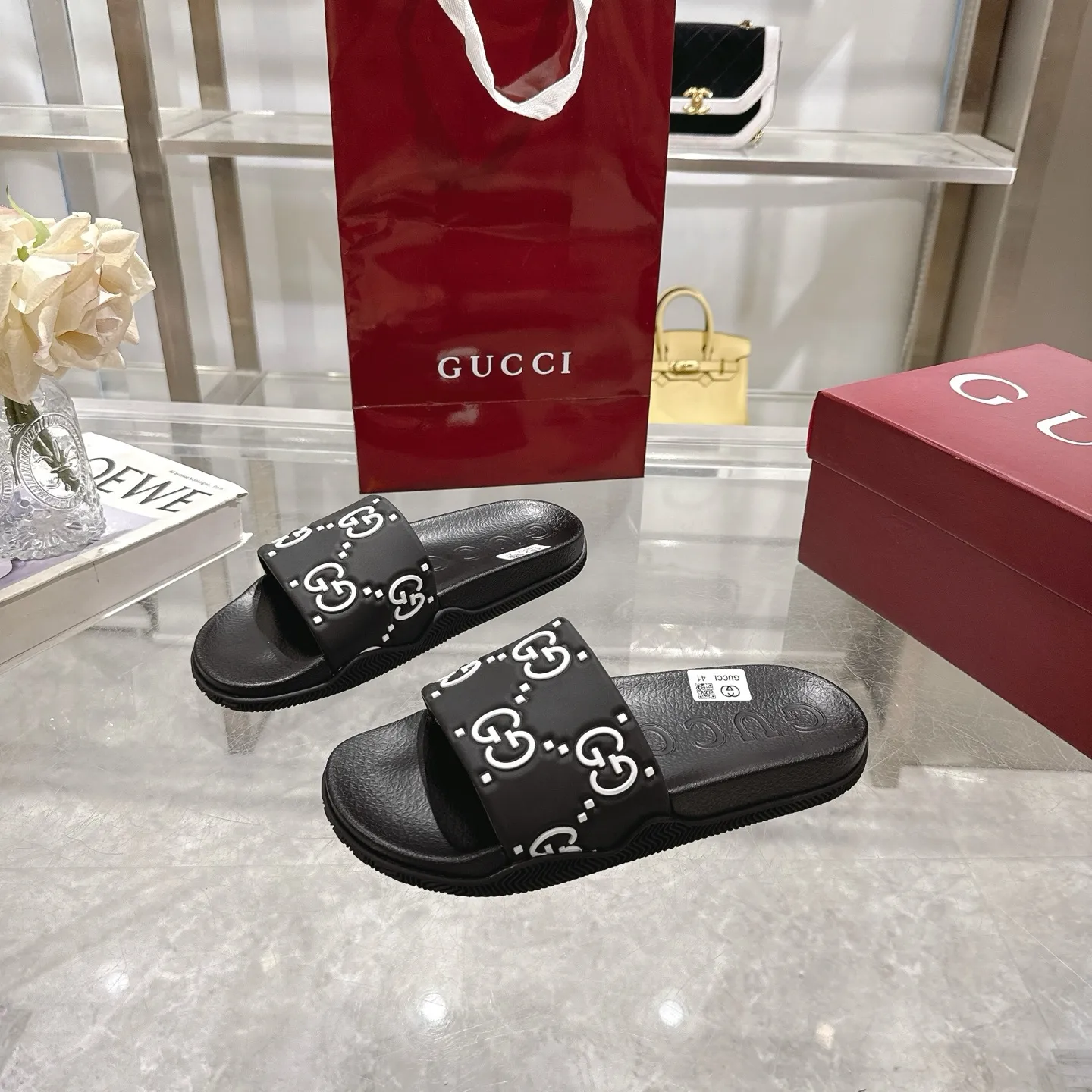 🅿️300💰 🌹Gucci official website Good Game slippers and sandals for men and women. In this special edition series, the acronym of the brand founder Guccio Gucci gives new meaning. In the gaming world, "GG" is a symbol of good sportsmanship and stands for "Good Game," which conveys the value system of the community. The modern acronym is a playful ode to the brand’s origins in the world of sports and leisure, illustrating how Gucci’s heritage continues to evolve. The parting greeting expresses the Gucci Good Game motto as the brand moves into new worlds, creating centers of play, self-expression, talent, freedom and individuality. Made with a rubber upper, these slippers are embellished with the collection's signature logo.  Rubber upper, unisex, G logo embossed, molded footbed, rubber sole, flat, made in Italy, sizes 36 to 46